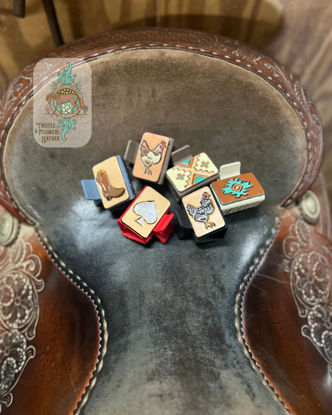 Grouping of medium sized hair clips from the homestead collection on a saddle seat. Photo is taken straight on. Logo is in the top left of photo.